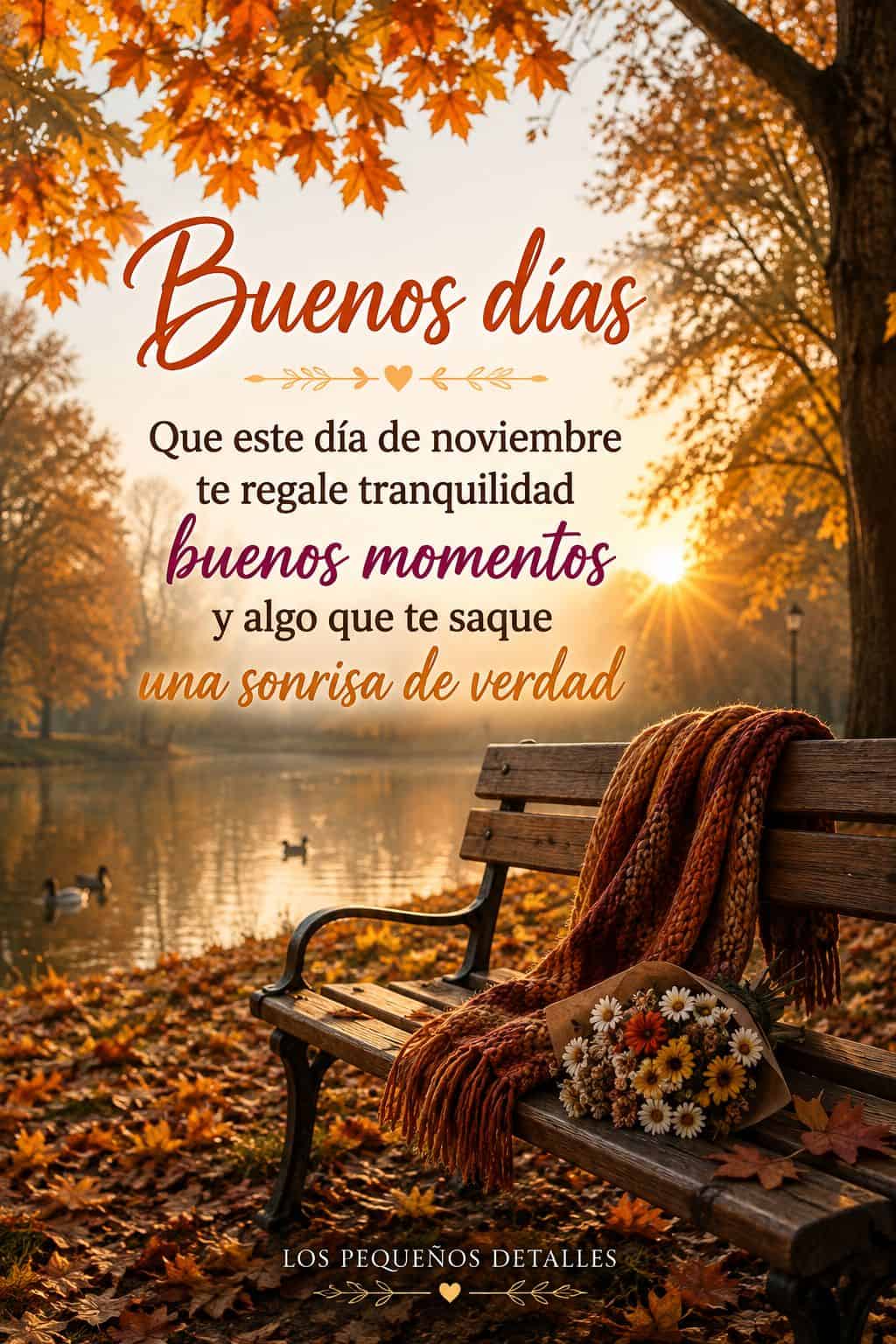 Imagen otoñal junto a un lago al amanecer, con árboles en tonos naranjas, hojas caídas, un banco de madera con una manta y un ramo de flores. Incluye la frase “Buenos días. Que este día de noviembre te regale tranquilidad, buenos momentos y algo que te saque una sonrisa de verdad